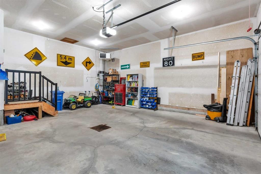 34 Lund Close, Red Deer, AB - Indoor Photo Showing Garage