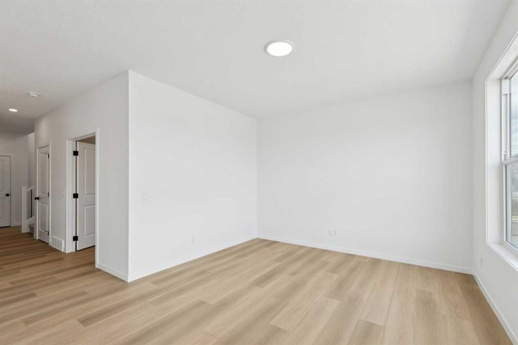 17 Southborough Common, Cochrane, AB - Indoor Photo Showing Other Room