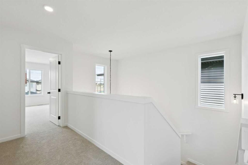 17 Southborough Common, Cochrane, AB - Indoor Photo Showing Other Room
