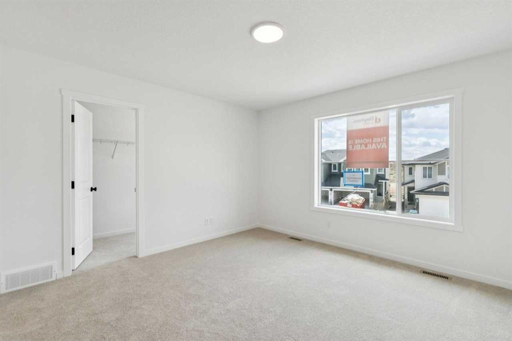 17 Southborough Common, Cochrane, AB - Indoor Photo Showing Other Room