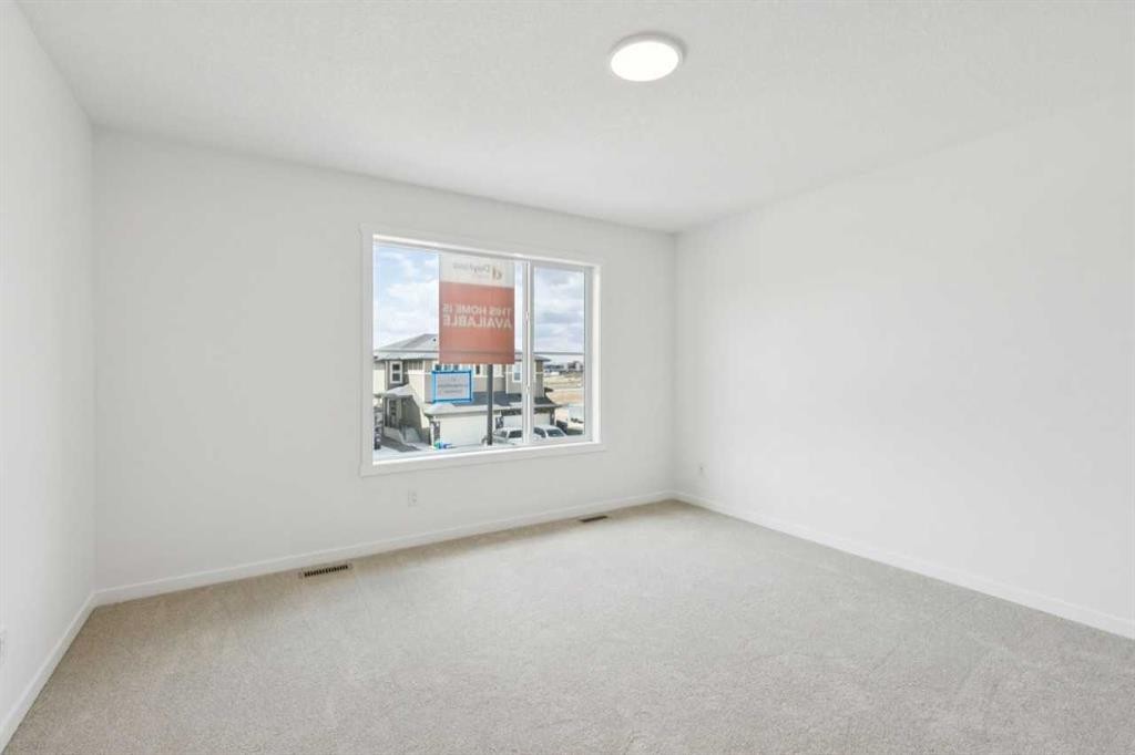 17 Southborough Common, Cochrane, AB - Indoor Photo Showing Other Room