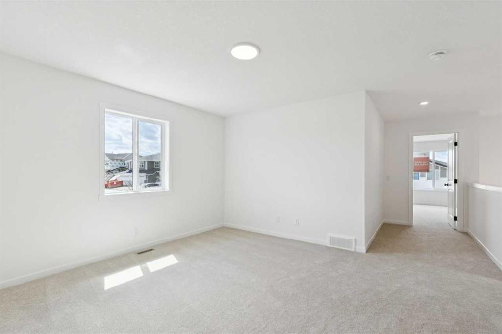 17 Southborough Common, Cochrane, AB - Indoor Photo Showing Other Room