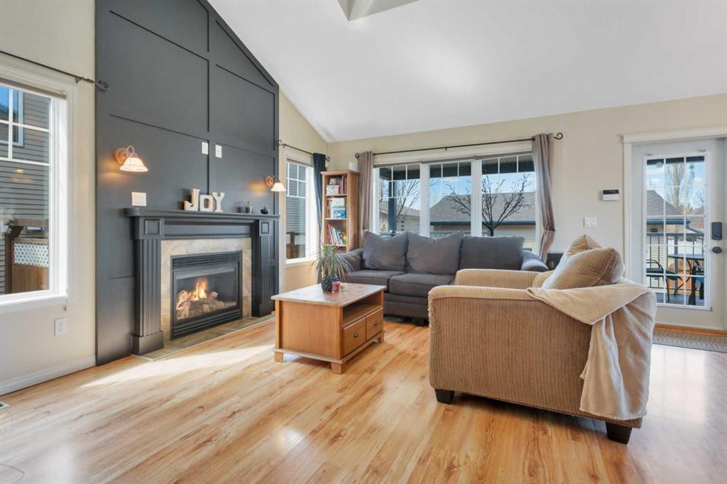 100 Wade Close, Red Deer, AB - Indoor Photo Showing Living Room With Fireplace