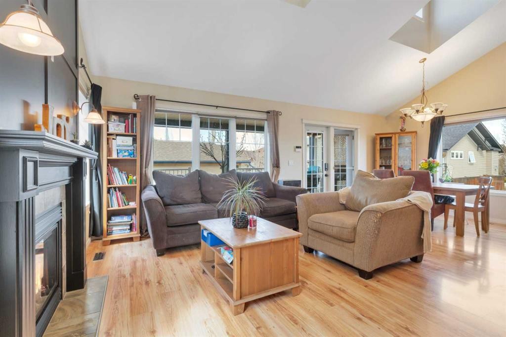 100 Wade Close, Red Deer, AB - Indoor Photo Showing Living Room With Fireplace