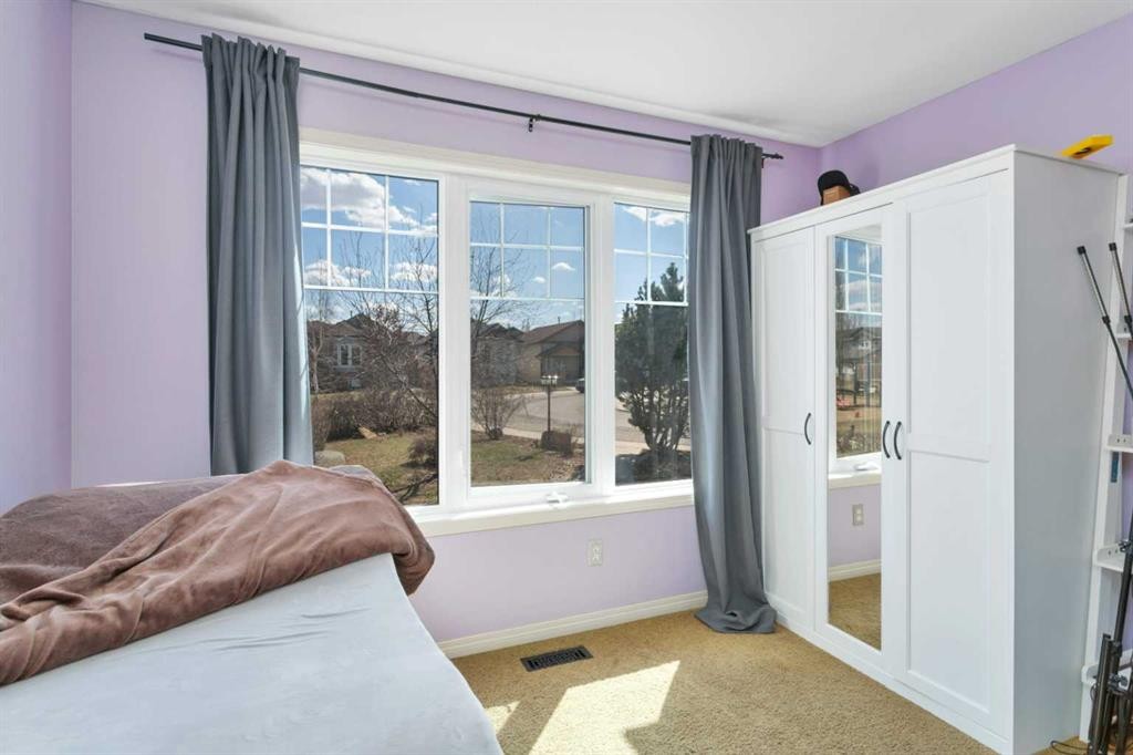 100 Wade Close, Red Deer, AB - Indoor Photo Showing Bedroom