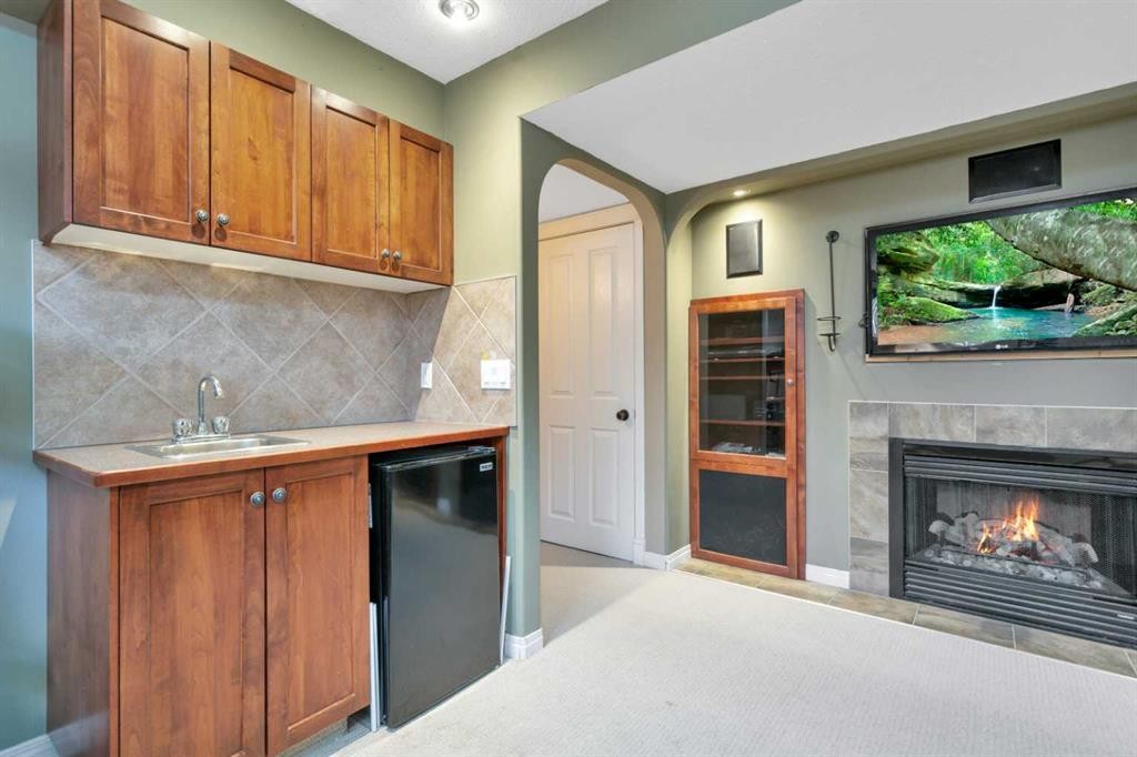100 Wade Close, Red Deer, AB - Indoor With Fireplace