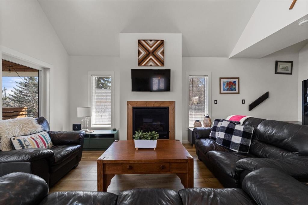 62 Sands Street, Rochon Sands, AB - Indoor Photo Showing Living Room With Fireplace