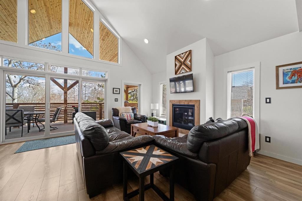 62 Sands Street, Rochon Sands, AB - Indoor Photo Showing Living Room With Fireplace