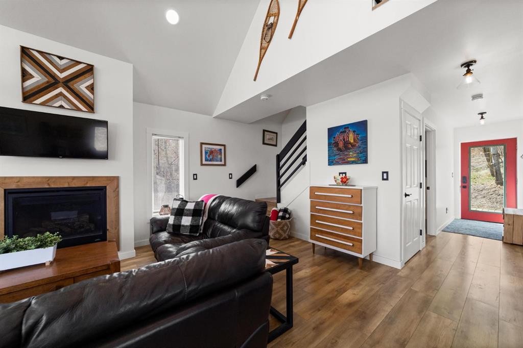 62 Sands Street, Rochon Sands, AB - Indoor Photo Showing Living Room With Fireplace