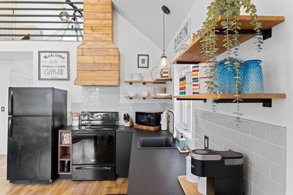 62 Sands Street, Rochon Sands, AB - Indoor Photo Showing Kitchen With Double Sink