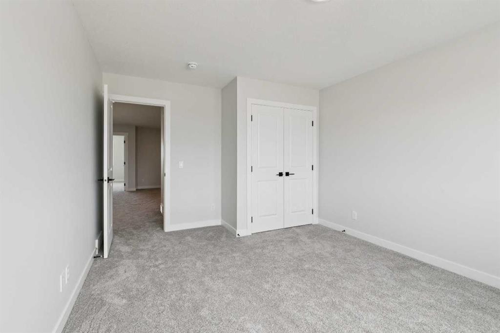 546 Hotchkiss Manor, Calgary, AB - Indoor Photo Showing Other Room