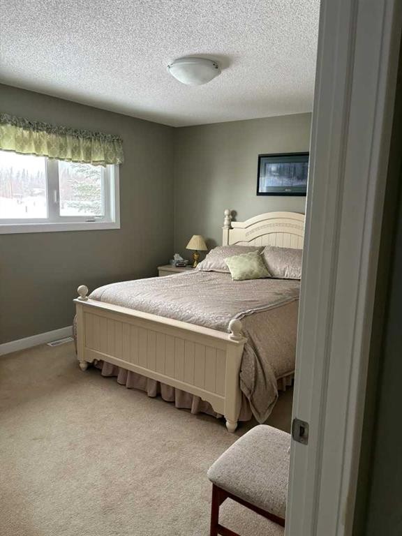 2987 Calling Lake Drive, Calling Lake, AB - Indoor Photo Showing Bedroom