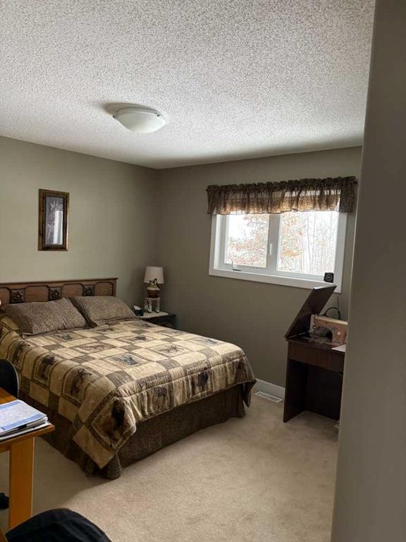 2987 Calling Lake Drive, Calling Lake, AB - Indoor Photo Showing Bedroom