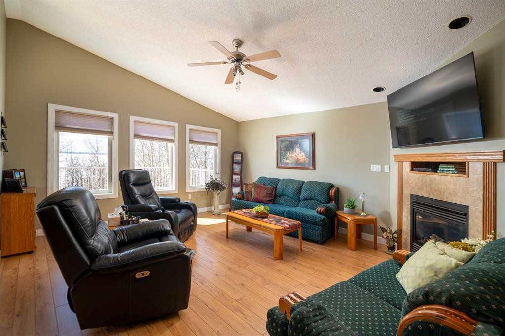 2987 Calling Lake Drive, Calling Lake, AB - Indoor Photo Showing Living Room With Fireplace