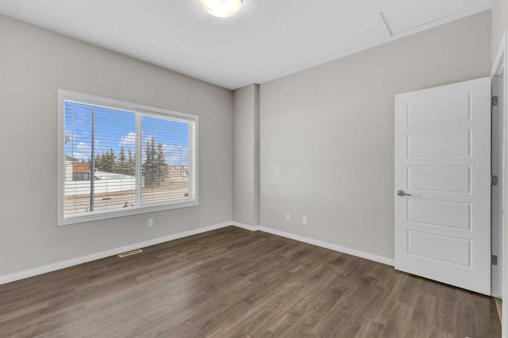149 Hawkridge Boulevard, Penhold, AB - Indoor Photo Showing Other Room