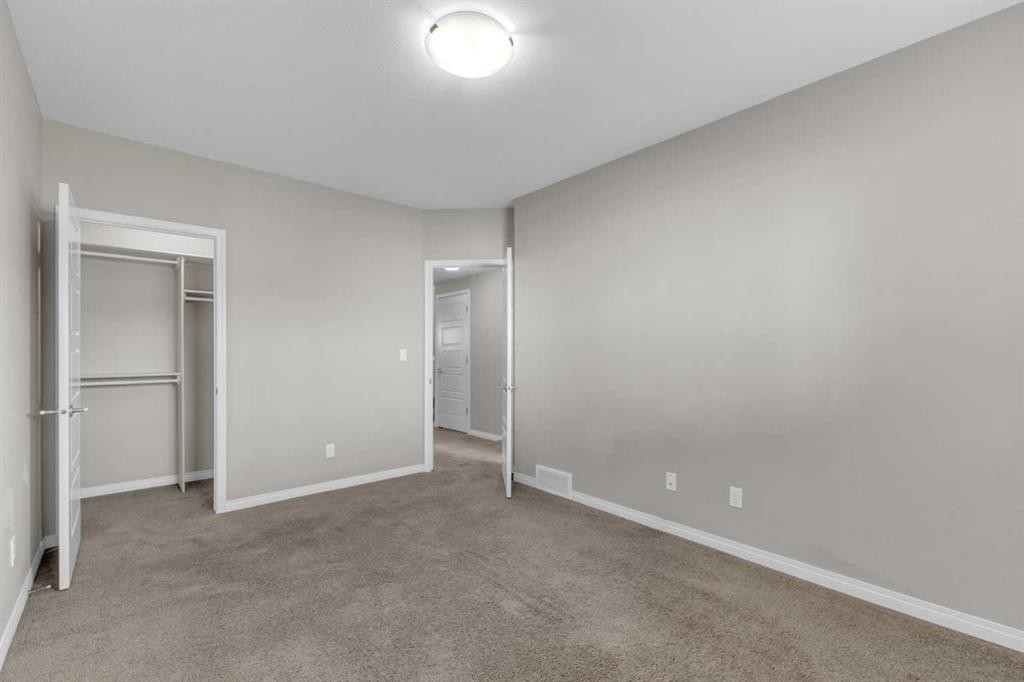 149 Hawkridge Boulevard, Penhold, AB - Indoor Photo Showing Other Room