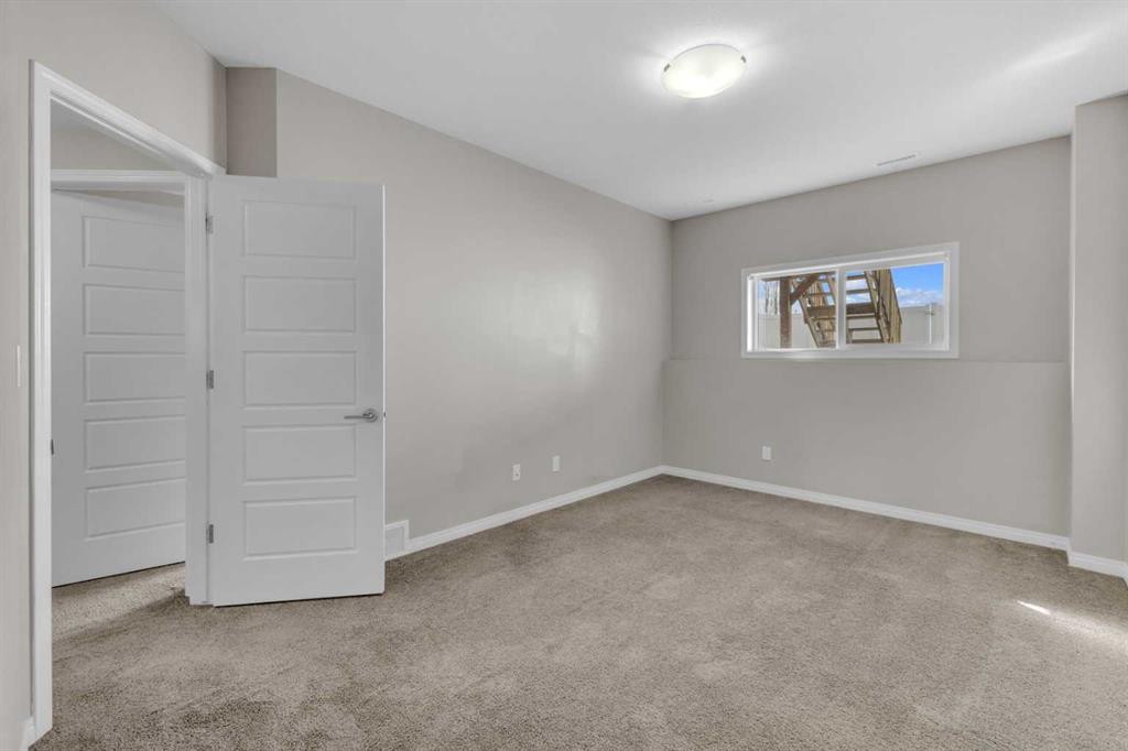 149 Hawkridge Boulevard, Penhold, AB - Indoor Photo Showing Other Room