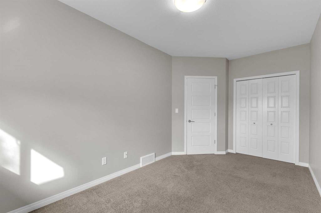 149 Hawkridge Boulevard, Penhold, AB - Indoor Photo Showing Other Room