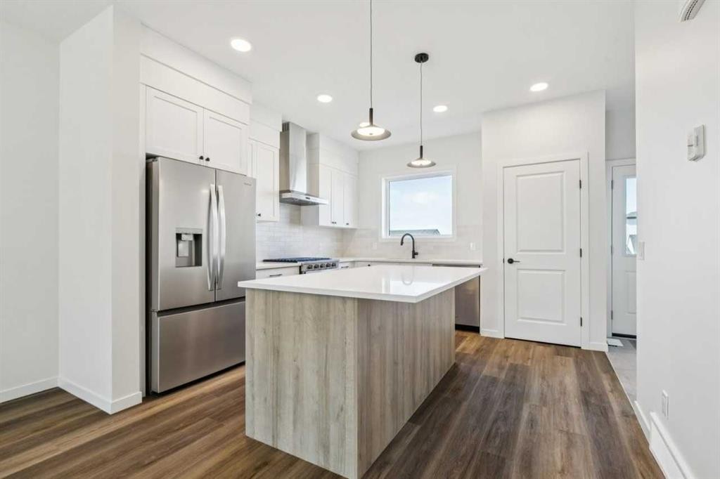 49 Bluerock Hill Sw, Calgary, AB - Indoor Photo Showing Kitchen With Upgraded Kitchen