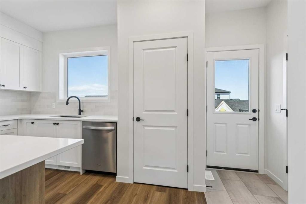 49 Bluerock Hill Sw, Calgary, AB - Indoor Photo Showing Other Room