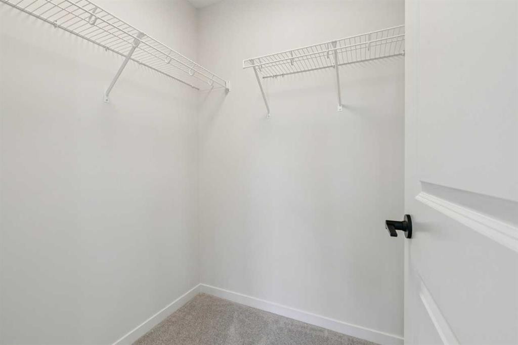 49 Bluerock Hill Sw, Calgary, AB - Indoor With Storage