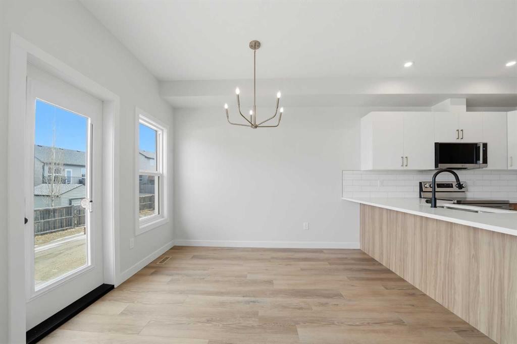 77 Pinnacle Close, Blackfalds, AB - Indoor Photo Showing Kitchen