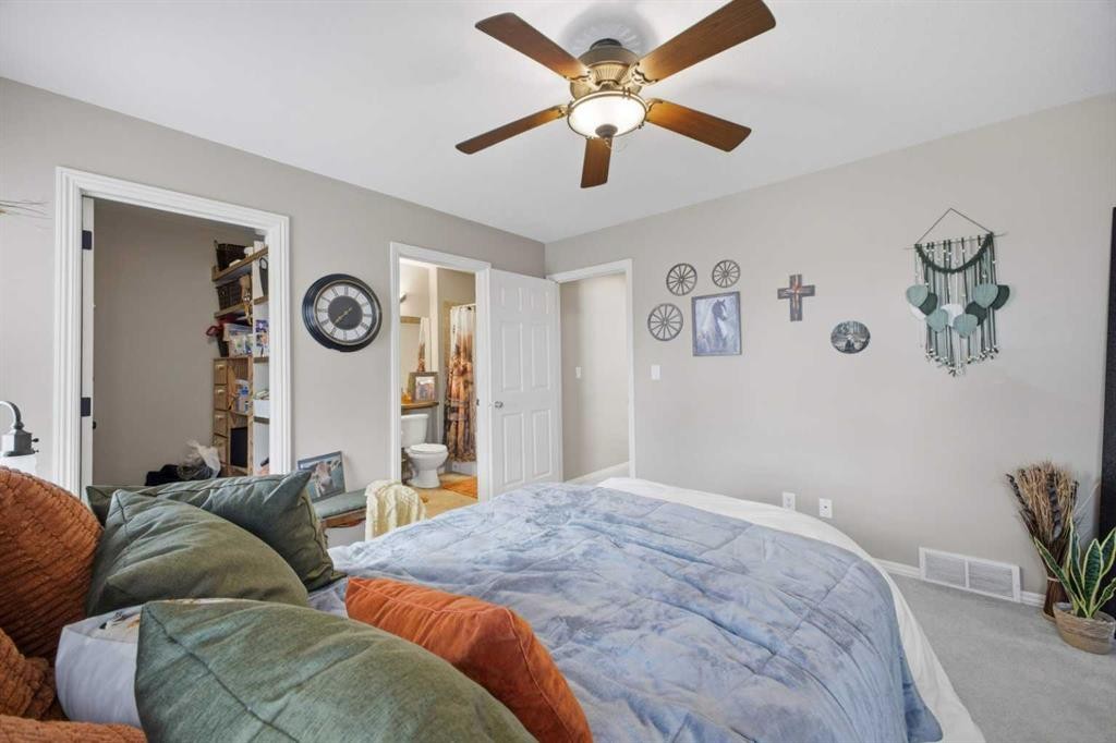 135 Issard Close, Red Deer, AB - Indoor Photo Showing Bedroom