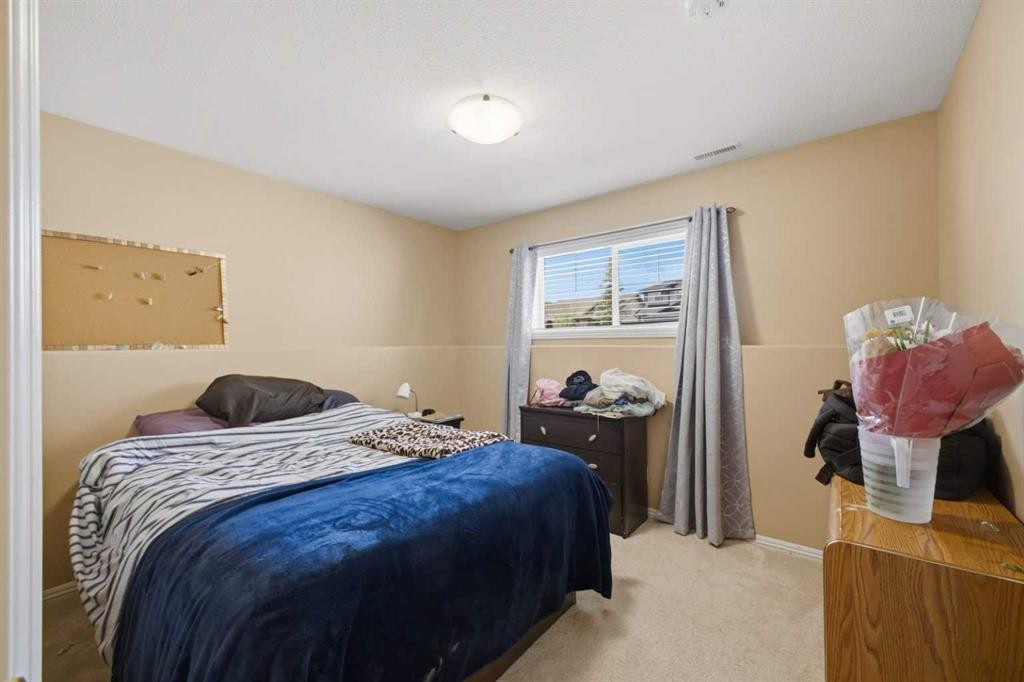 135 Issard Close, Red Deer, AB - Indoor Photo Showing Bedroom