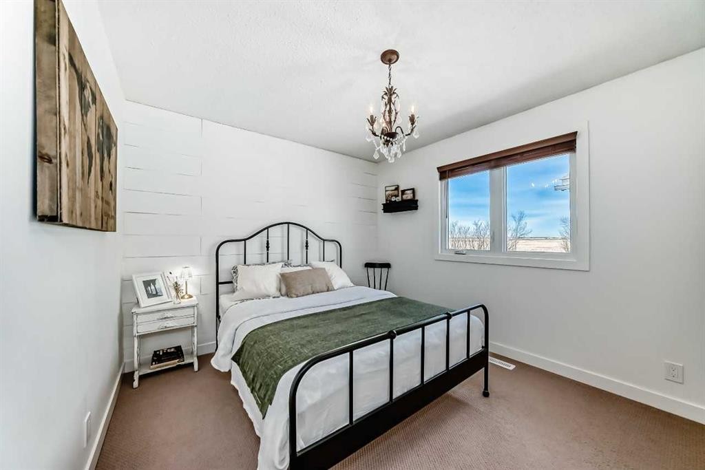 302064 Range Road, Linden, AB - Indoor Photo Showing Bedroom