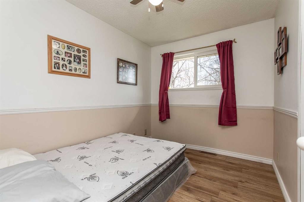 62 Nance Avenue, Red Deer, AB - Indoor Photo Showing Bedroom
