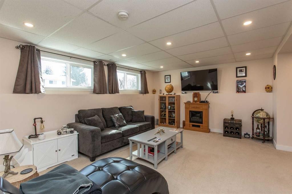 62 Nance Avenue, Red Deer, AB - Indoor With Fireplace