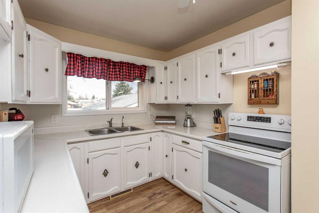 62 Nance Avenue, Red Deer, AB - Indoor Photo Showing Kitchen With Double Sink