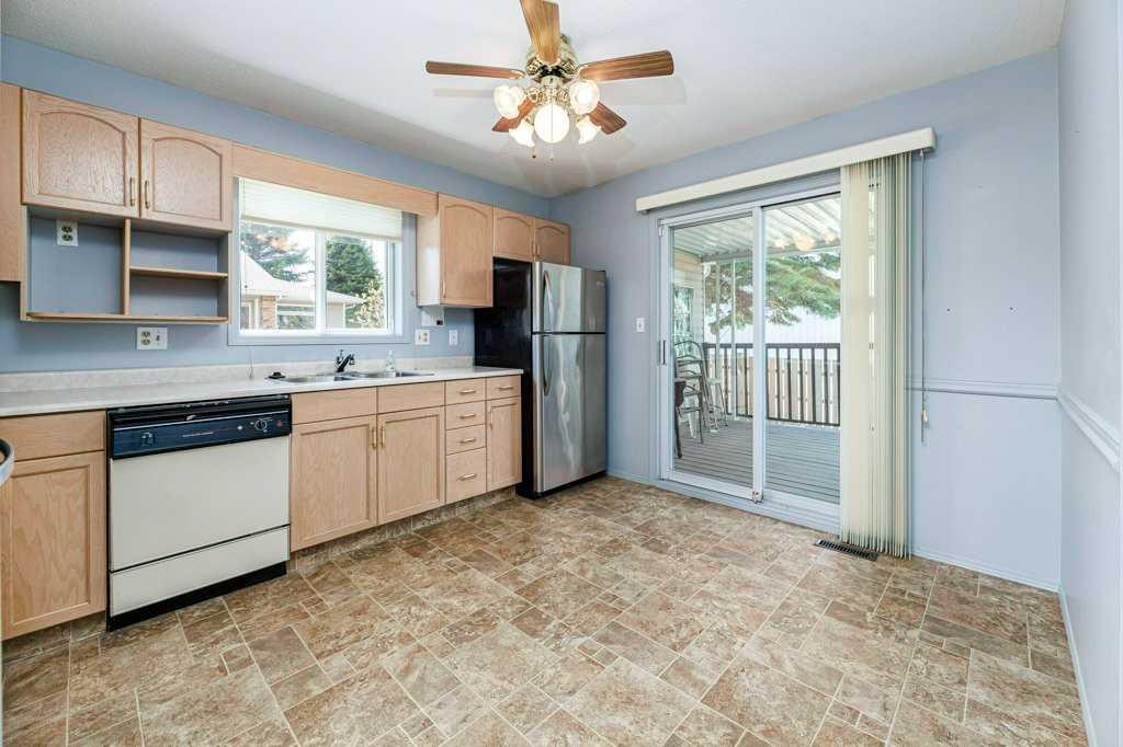 61-2816 Botterill Crescent, Red Deer, AB - Indoor Photo Showing Kitchen With Double Sink