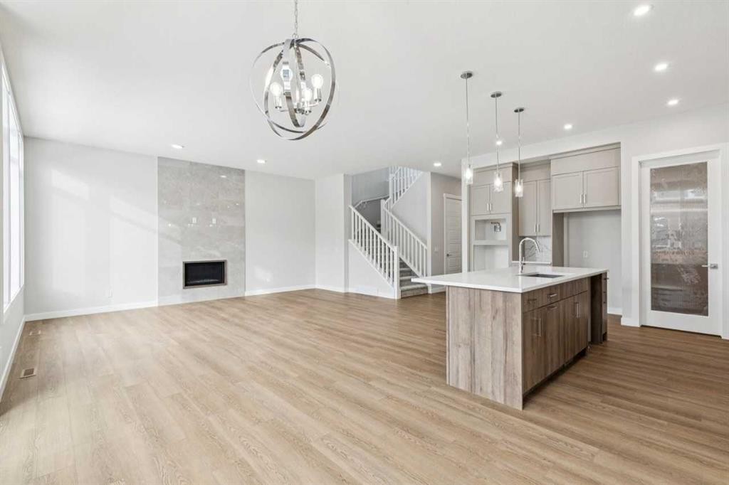 261 Dawson Wharf Crescent, Chestermere, AB - Indoor With Fireplace