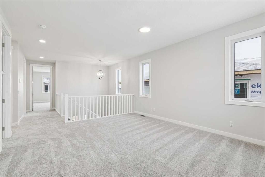 261 Dawson Wharf Crescent, Chestermere, AB - Indoor Photo Showing Other Room