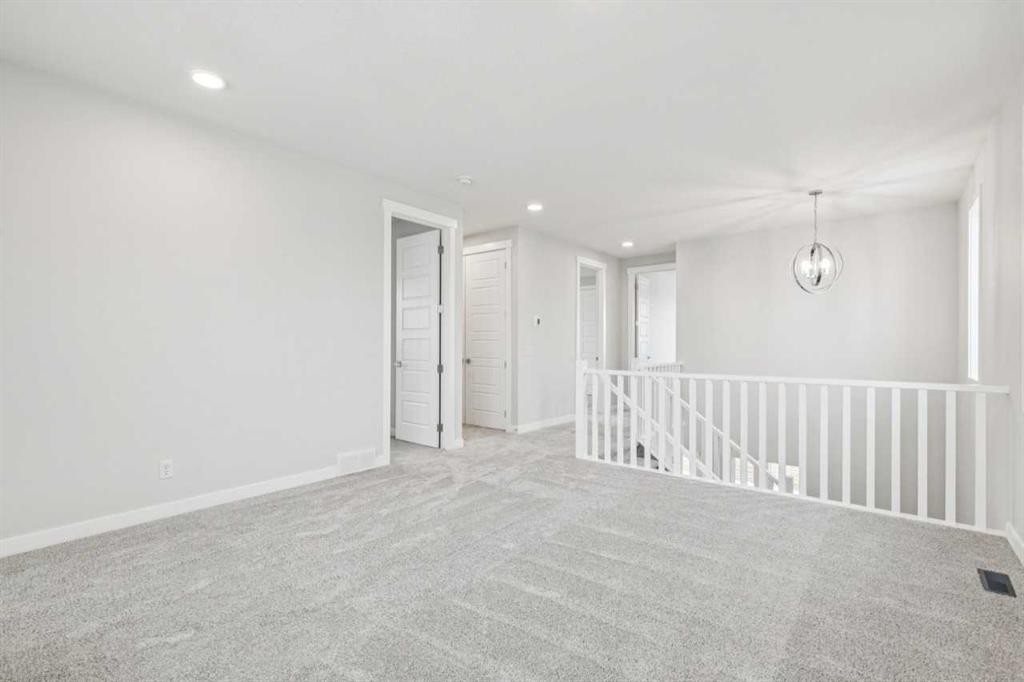 261 Dawson Wharf Crescent, Chestermere, AB - Indoor Photo Showing Other Room