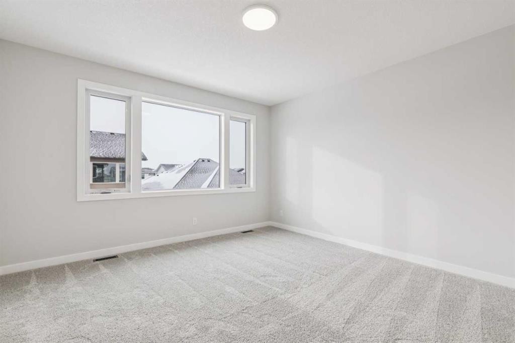 261 Dawson Wharf Crescent, Chestermere, AB - Indoor Photo Showing Other Room