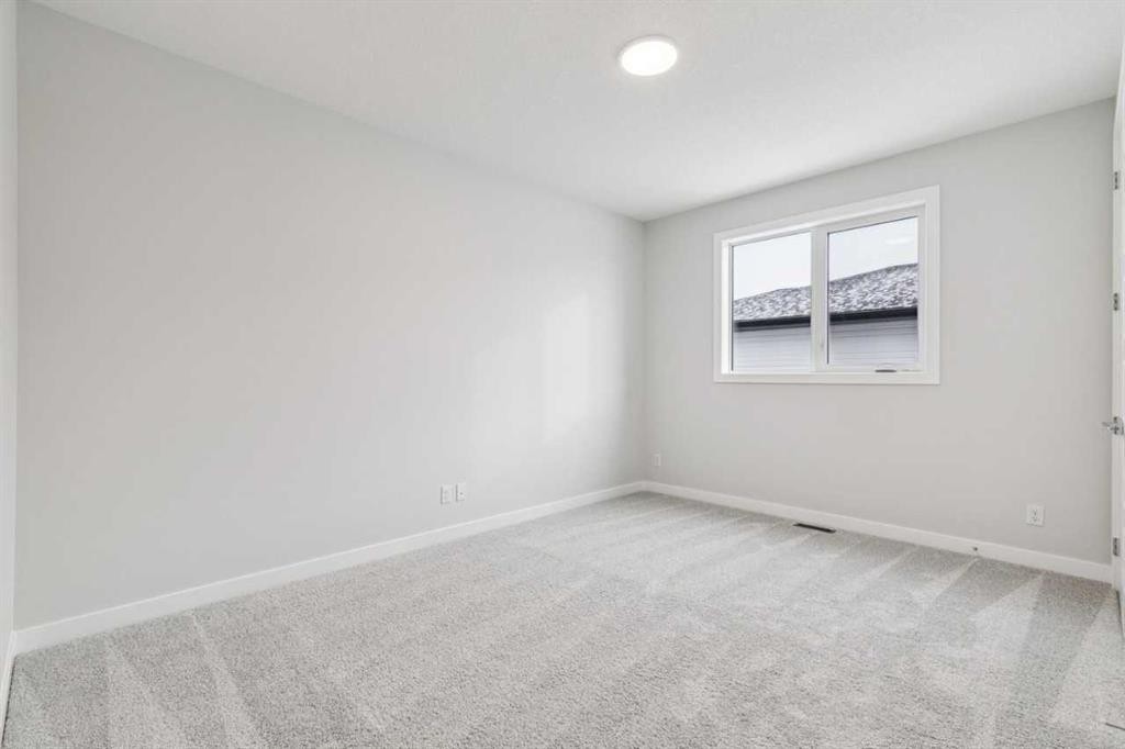 261 Dawson Wharf Crescent, Chestermere, AB - Indoor Photo Showing Other Room