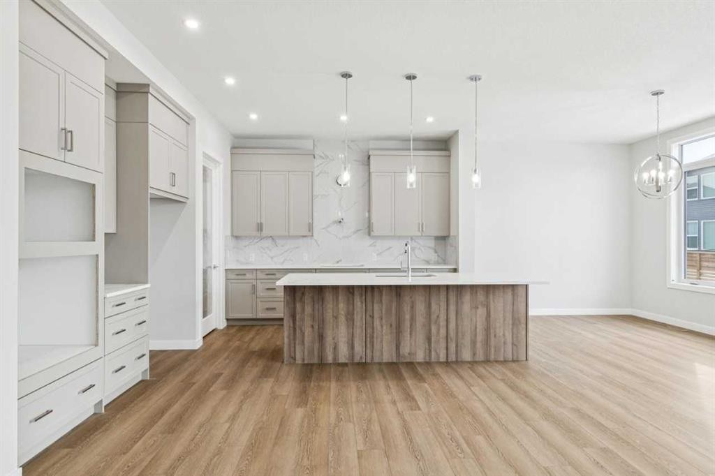 261 Dawson Wharf Crescent, Chestermere, AB - Indoor Photo Showing Kitchen With Upgraded Kitchen
