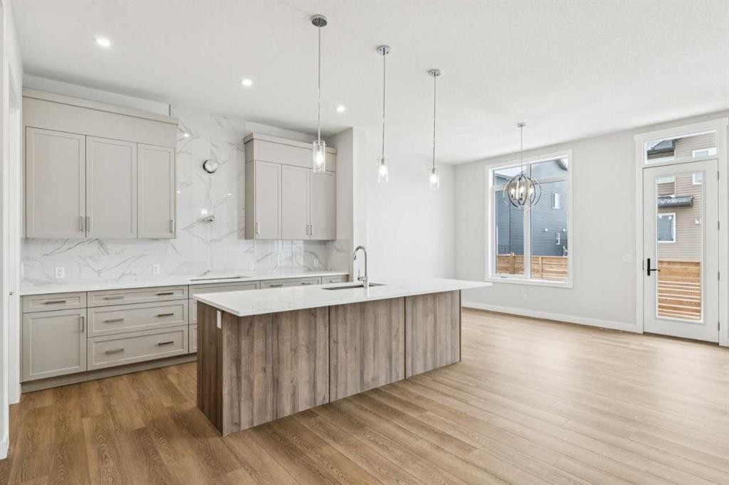 261 Dawson Wharf Crescent, Chestermere, AB - Indoor Photo Showing Kitchen With Upgraded Kitchen