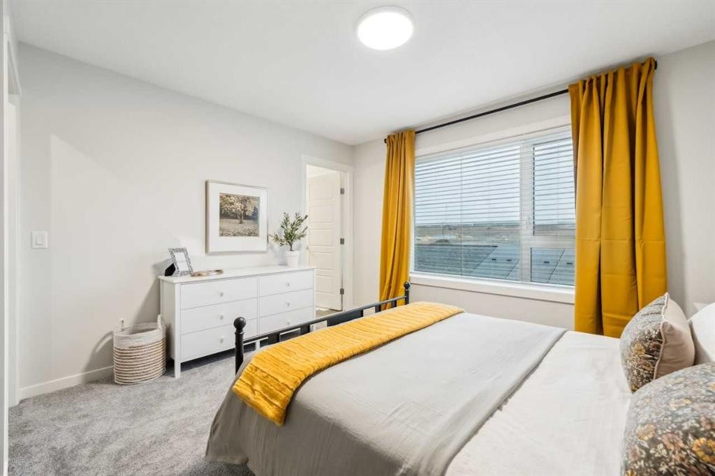 229 Vantage Drive, Cochrane, AB - Indoor Photo Showing Bedroom