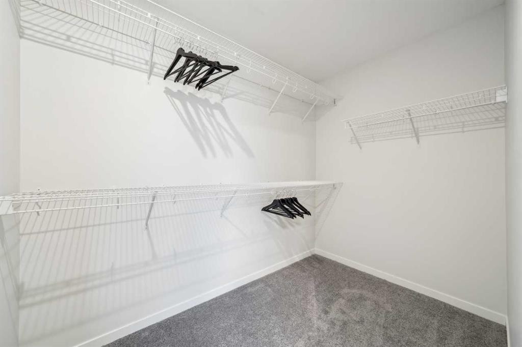 229 Vantage Drive, Cochrane, AB - Indoor With Storage