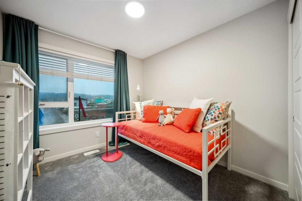 229 Vantage Drive, Cochrane, AB - Indoor Photo Showing Bedroom