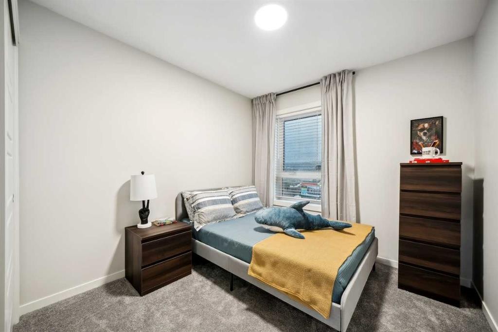 229 Vantage Drive, Cochrane, AB - Indoor Photo Showing Bedroom