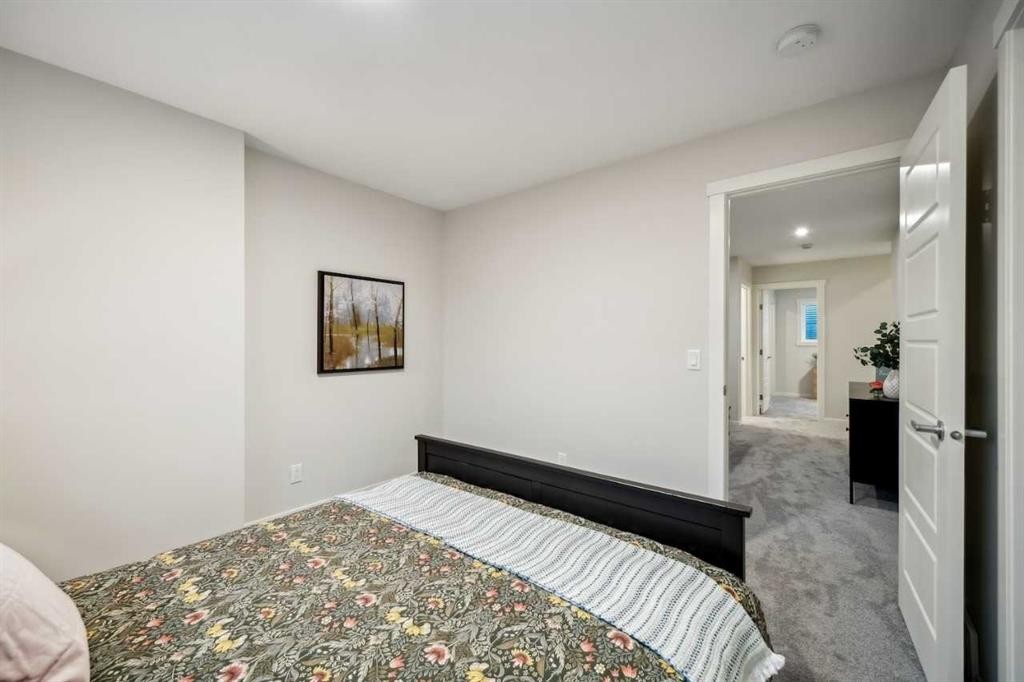 229 Vantage Drive, Cochrane, AB - Indoor Photo Showing Bedroom