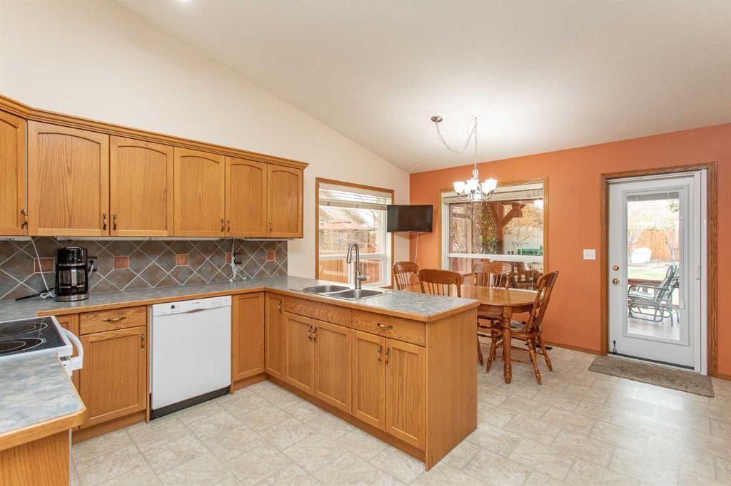 4908 55 Street, Alix, AB - Indoor Photo Showing Kitchen With Double Sink