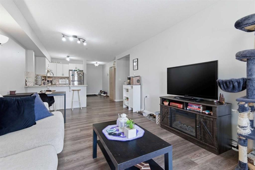 223A-80 Kelloway Crescent, Red Deer, AB - Indoor Photo Showing Living Room