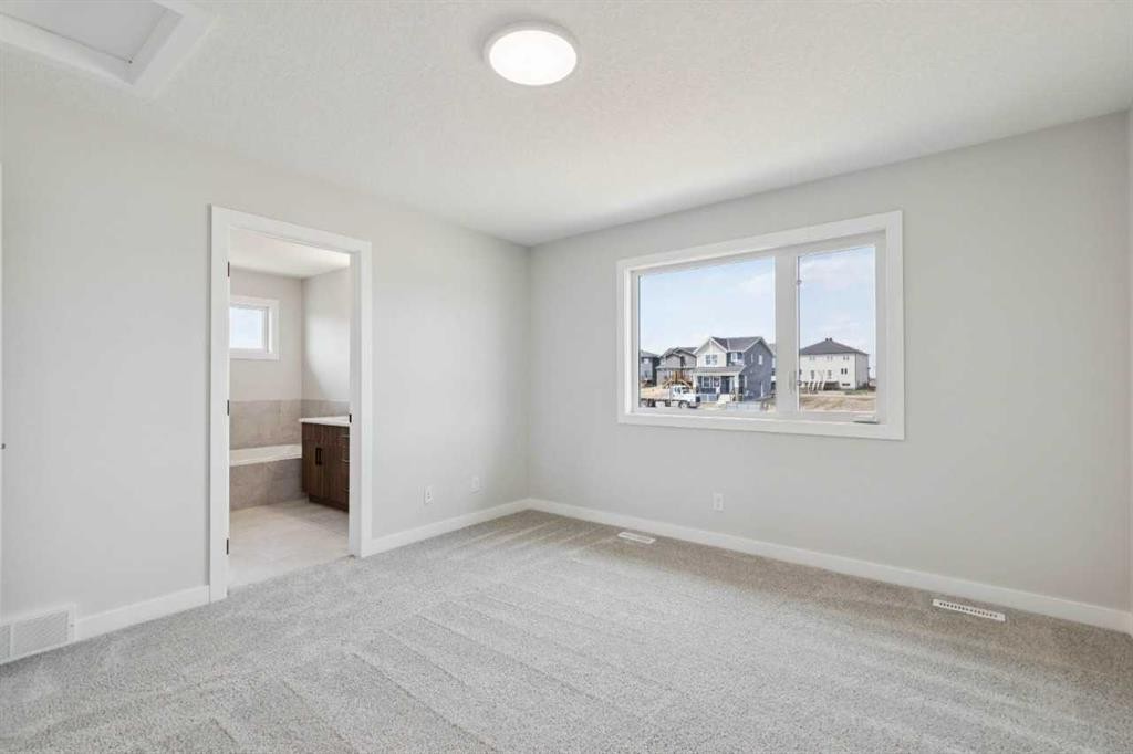 271 Bridgeport Circle, Chestermere, AB - Indoor Photo Showing Other Room