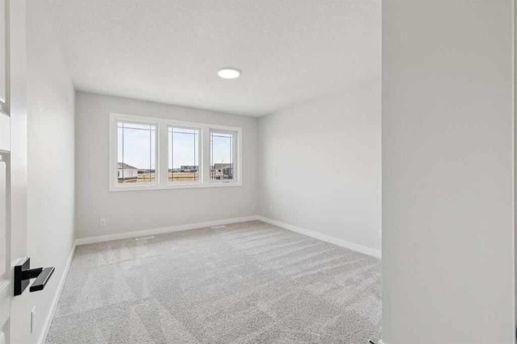 271 Bridgeport Circle, Chestermere, AB - Indoor Photo Showing Other Room