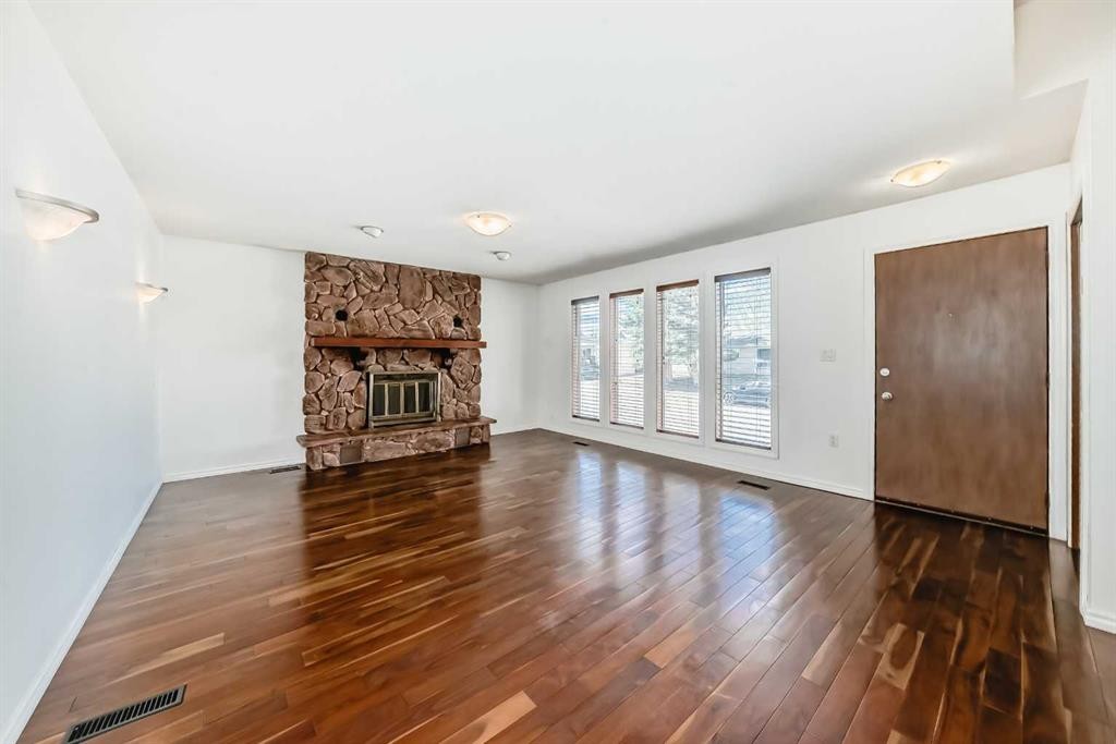2 Nichols Crescent, Red Deer, AB - Indoor Photo Showing Living Room With Fireplace